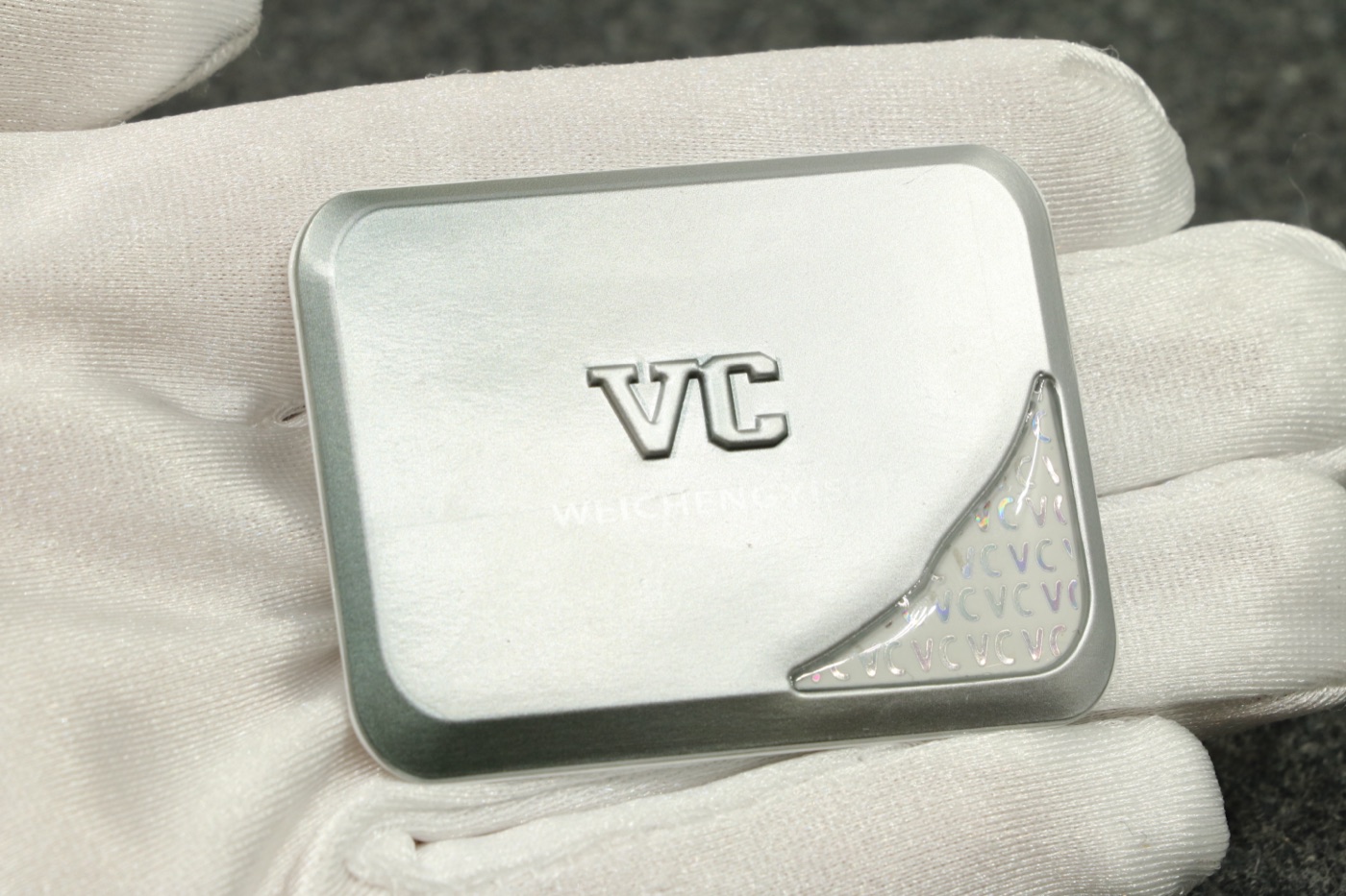 Metal effect emblem
